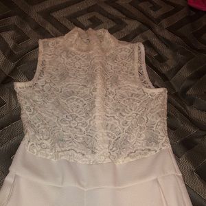 White lace sleeveless pants romper with pockets.